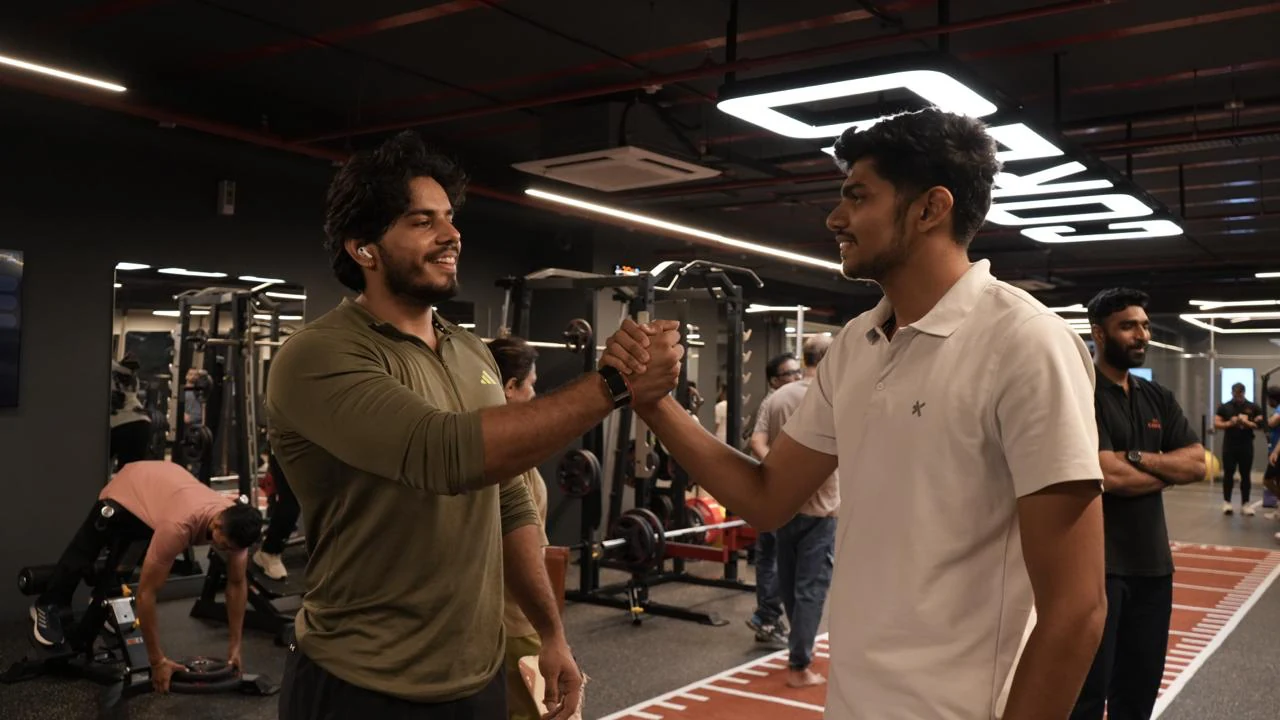 COREO members connecting on the gym floor