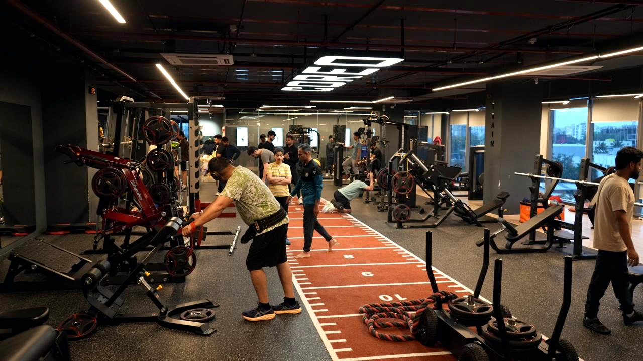 COREO members training across the gym floor