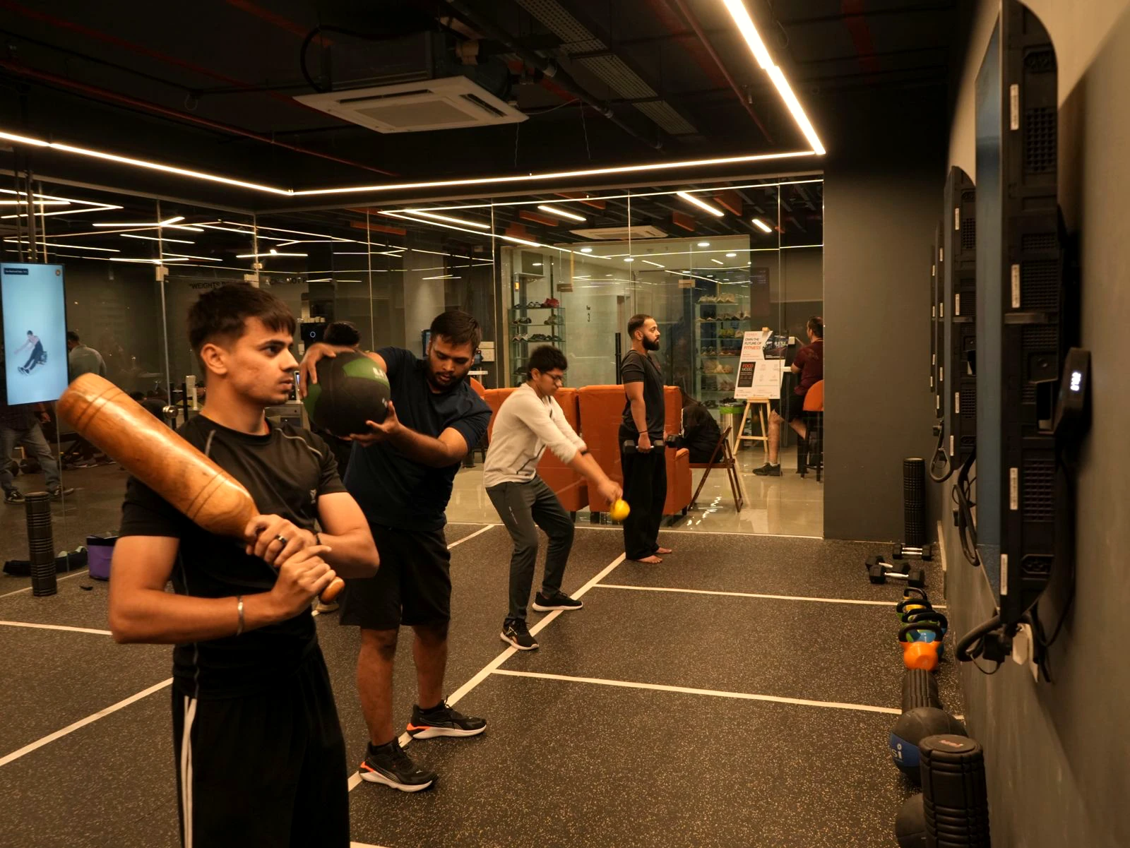 COREO coach supporting a member during training