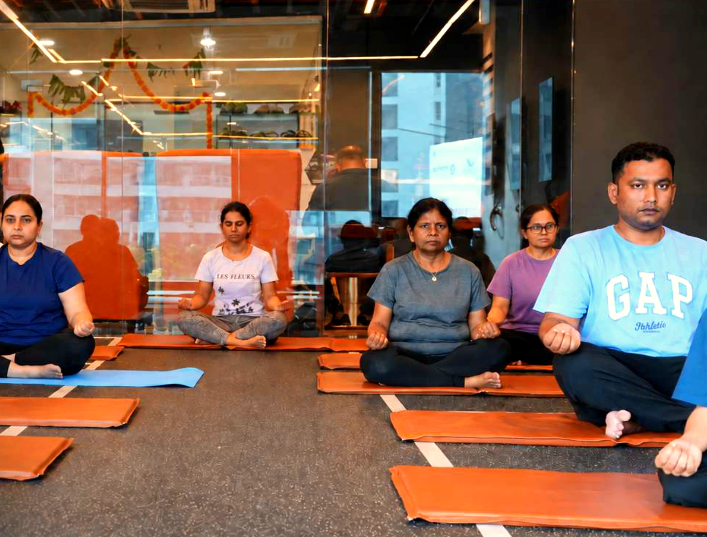 COREO members practising yoga and mobility