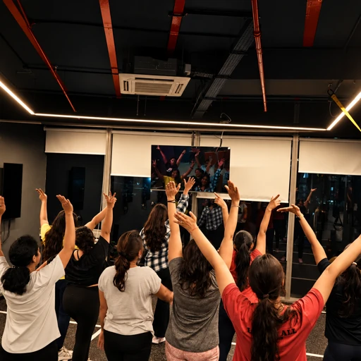 COREO Zumba class raising their hands together
